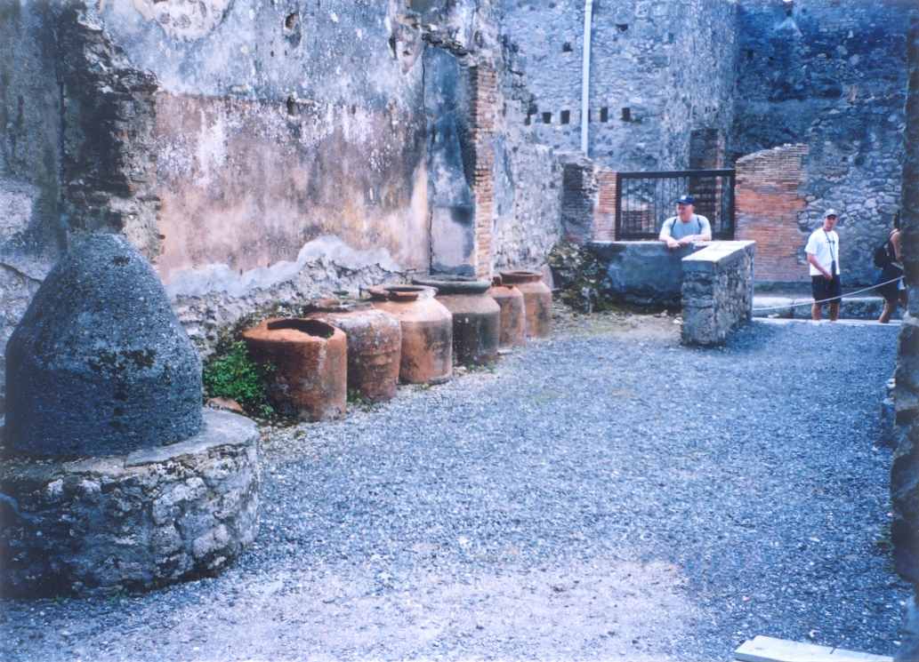 Bakery with storage jars and mill