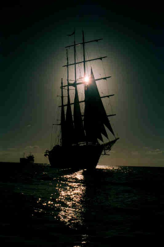 Star Clipper in sail off at sunset on 31 March 2000
