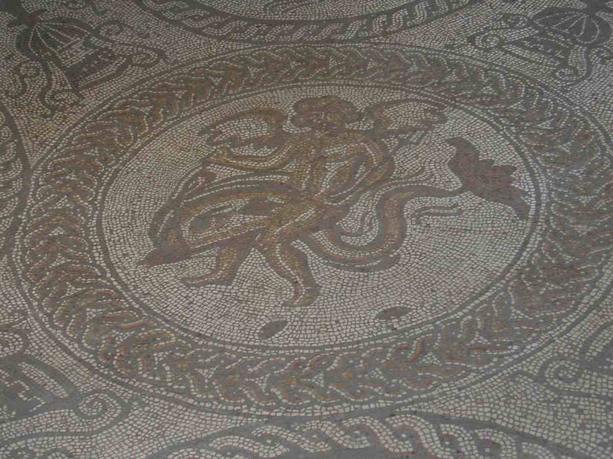 Cupid on a dolphin mosaic